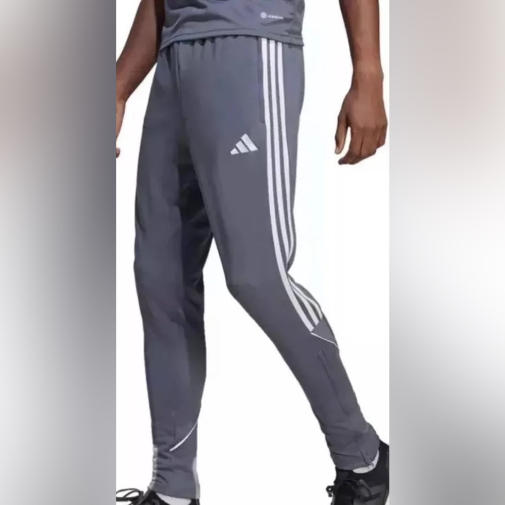 NWT Adidas Men's Charcoal Tiro23 track pants with White Stripes.